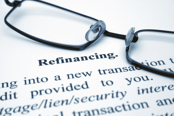 Eyeglass With Refinancing Word Being Highlighted