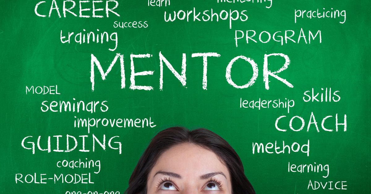 Extreme close-up of a woman's face looking up, with a background filled with words like mentorship programs.